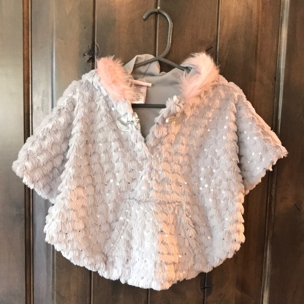 Little Lass 24 month never worn poncho with the option of having arm holes